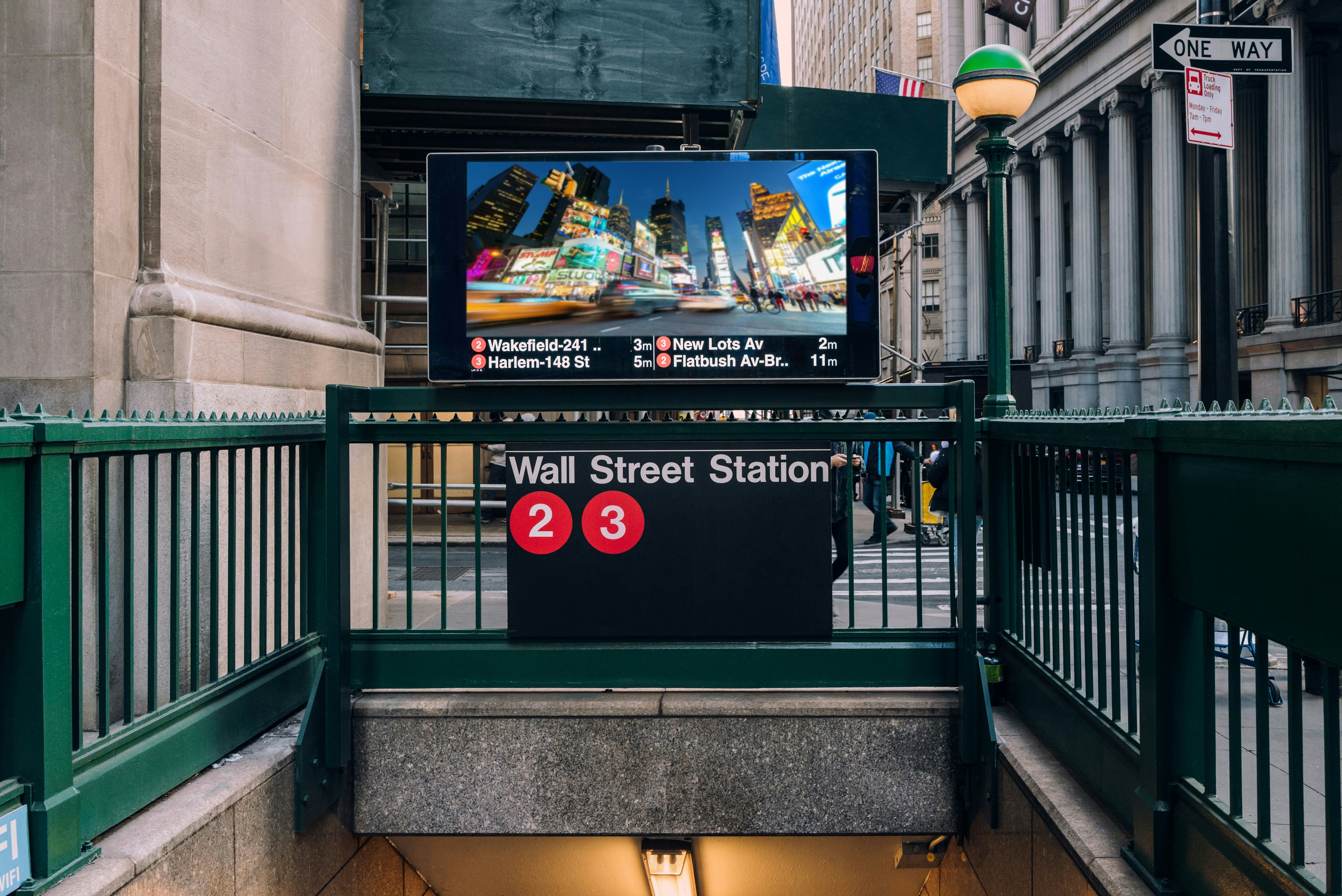 Concrete stairs going underground to the New York City Wall Street Station subway. 